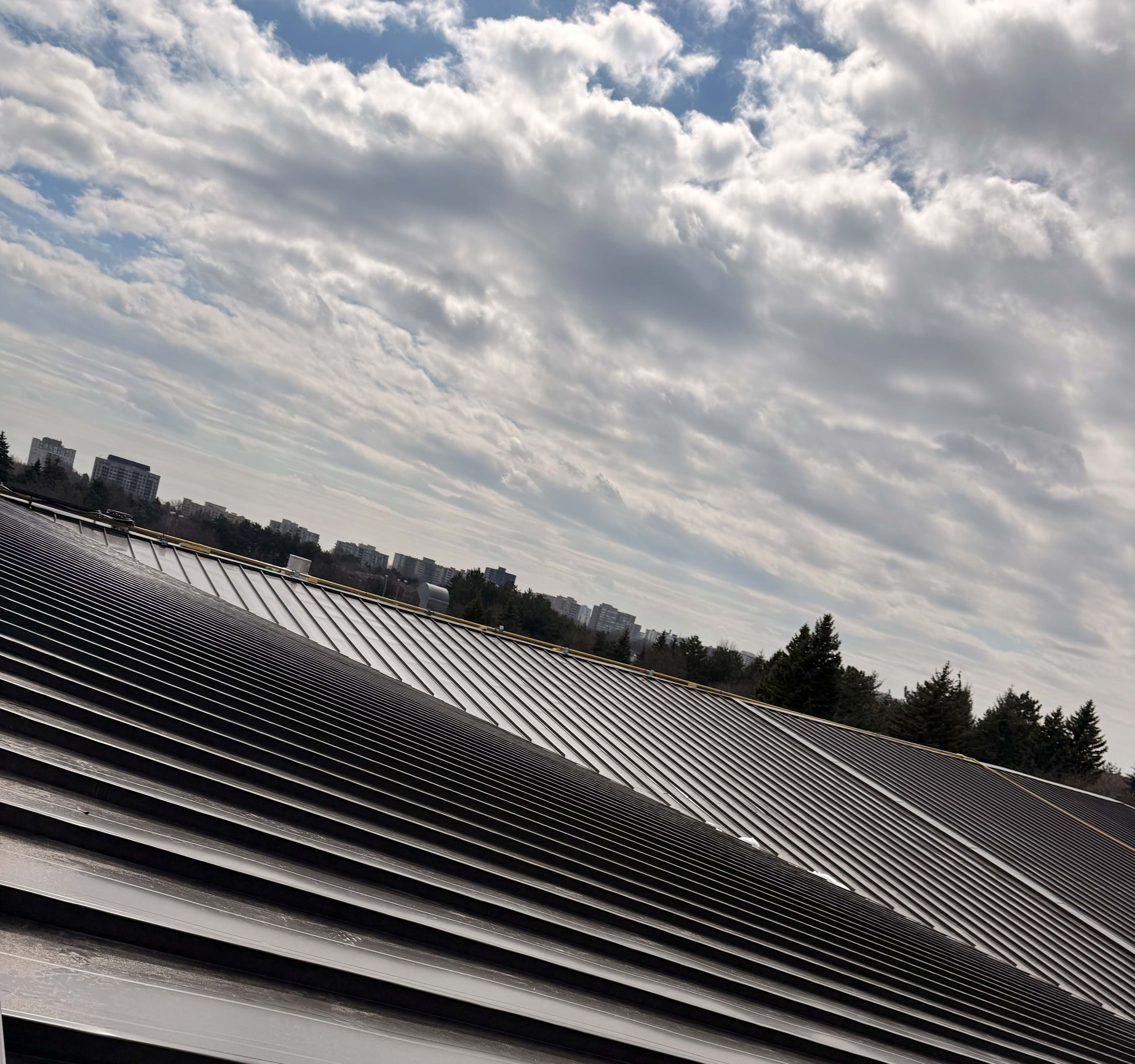 Standing seam metal roofing — commercial pyramid roof, GTA