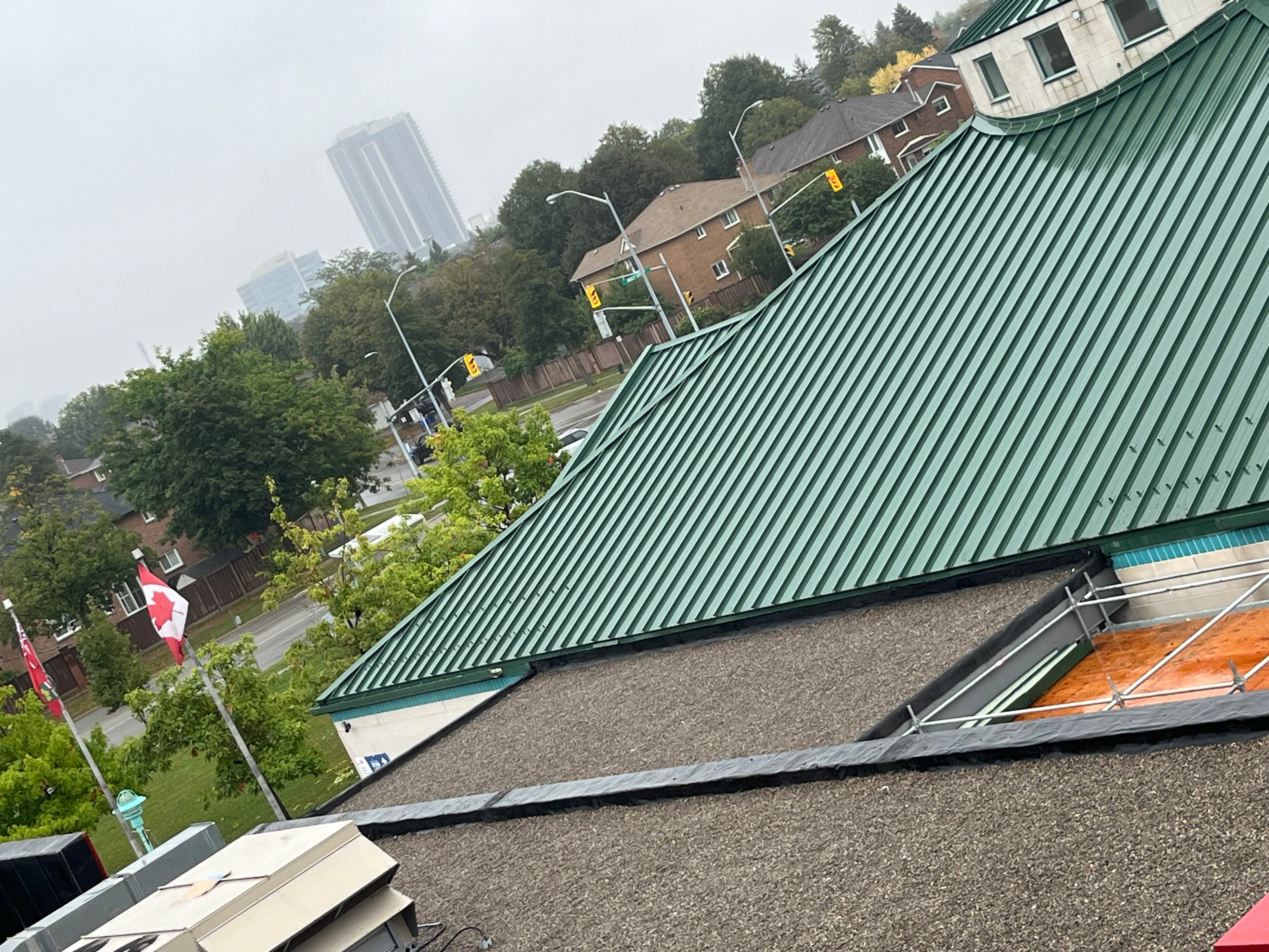 Exposed fastener metal roofing — green commercial roof, GTA