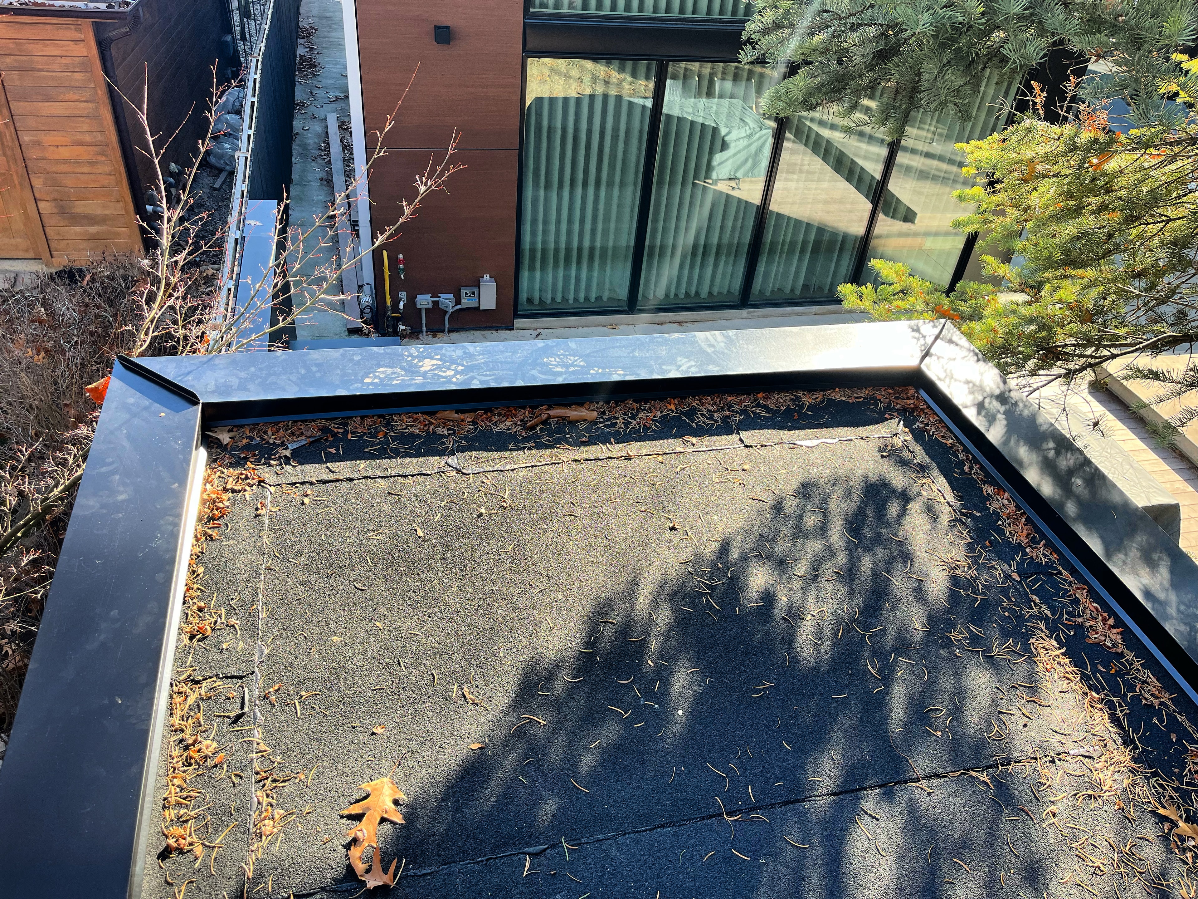 Standing seam metal roofing — blue residential roof, GTA